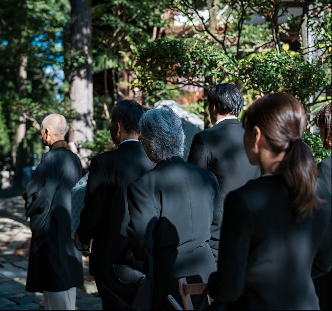 people attending a funeral