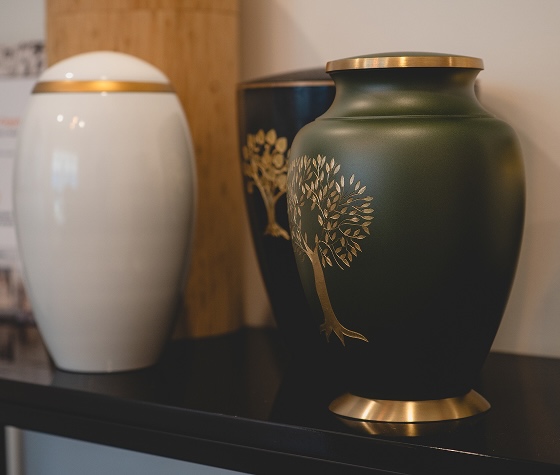 image of three urns on a table