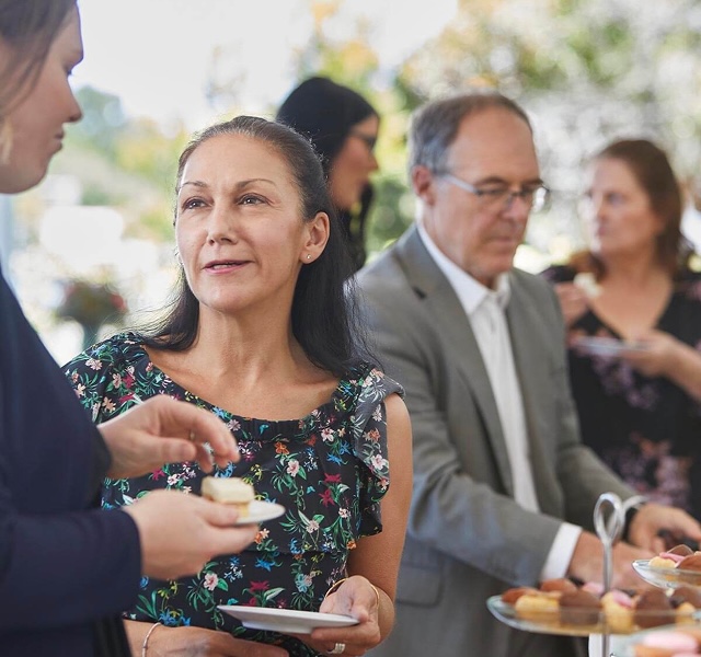 woman at funeral reception